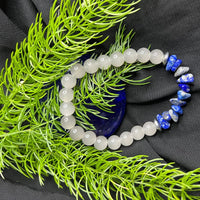 Blue and white stone bead bracelet displayed flat, showing color contrast and natural texture.