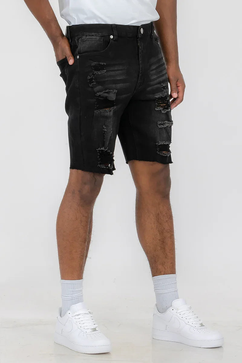 Side angle of men's distressed denim shorts showing standard pockets and button closure.