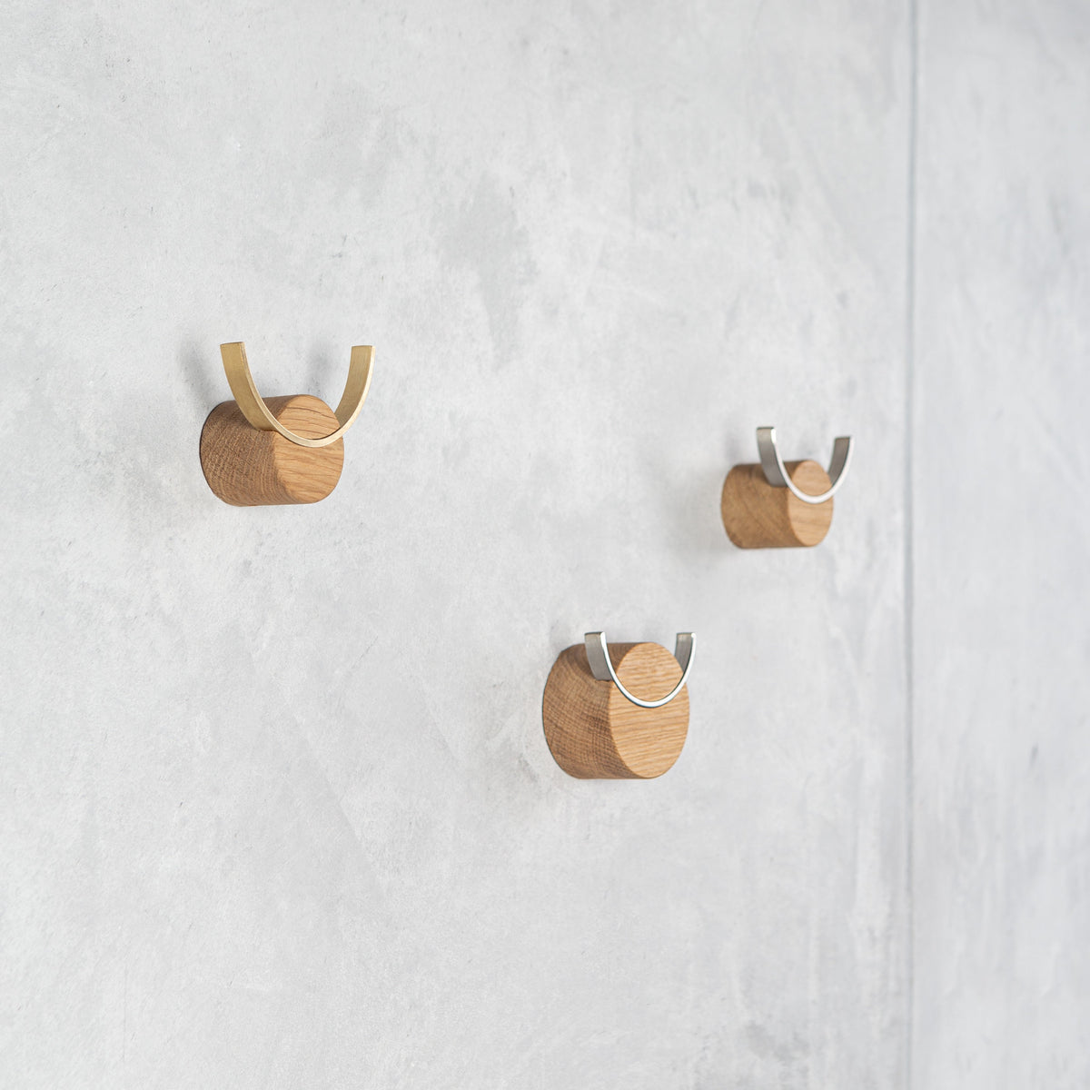 Wall hook DEER - installed on wall holding coat