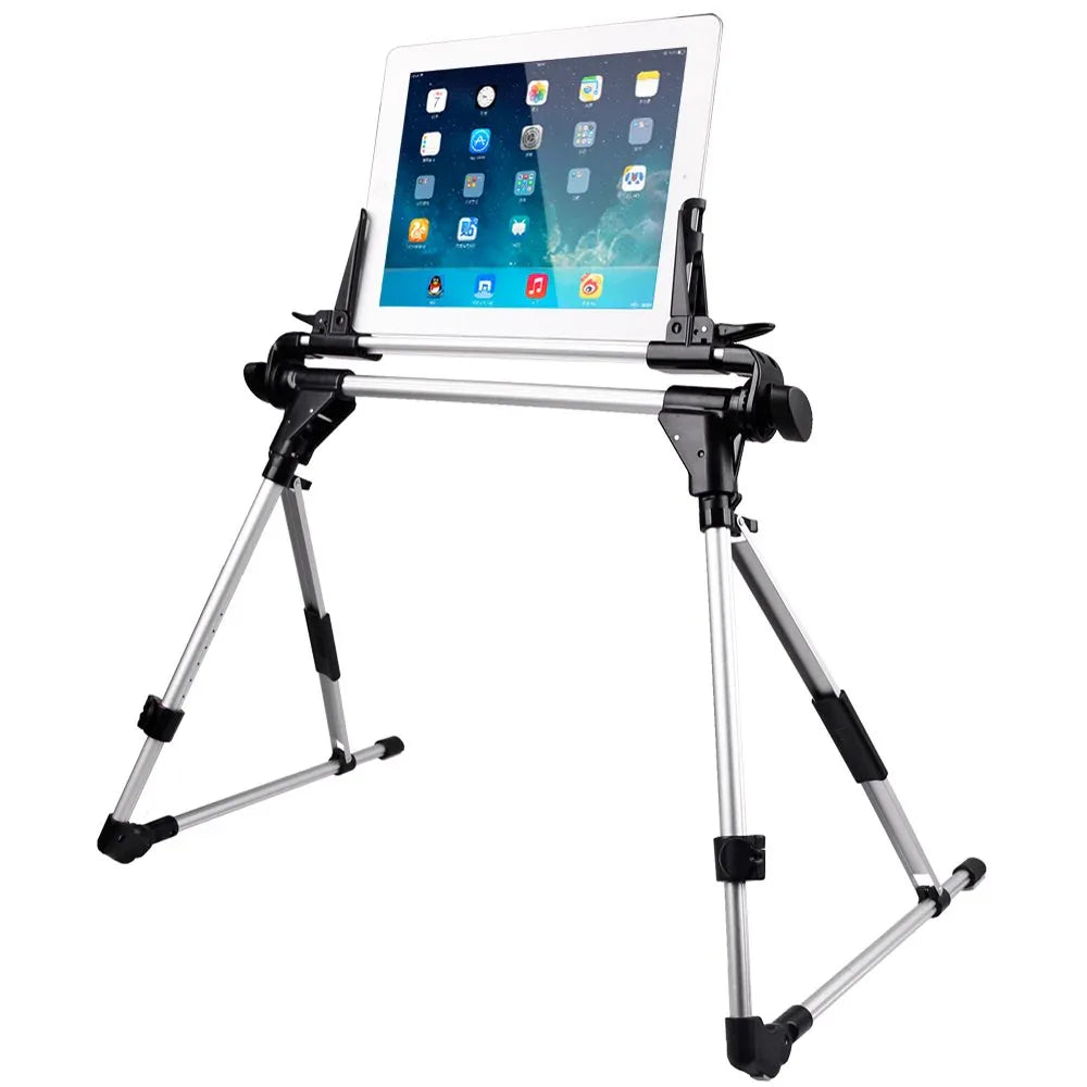 Foldable laptop and phone holder laid flat beside the bed, showing compact design