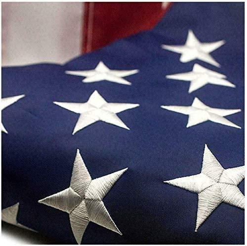 Close-up of embroidered stars on the outdoor heavy duty American flag with visible fabric texture.