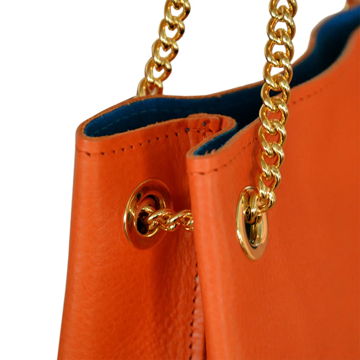 Close-up of embossed leather on Loving Handbag with Federica Terrida's poem engraving detail.