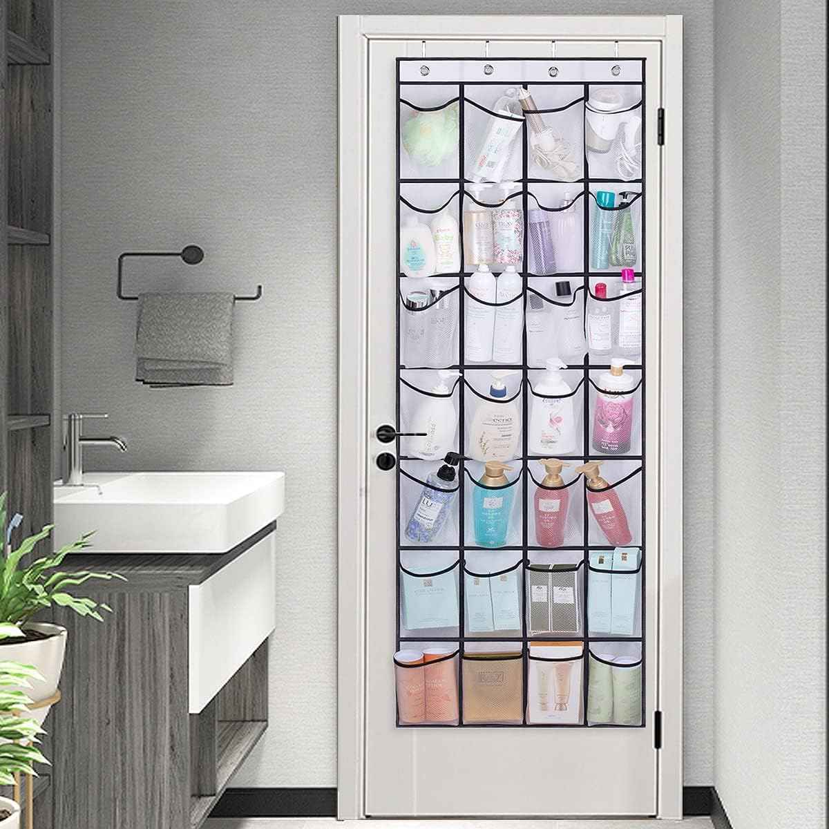 White over-the-door hanging organizer with 28 clear pockets, filled with shoes and small accessories.