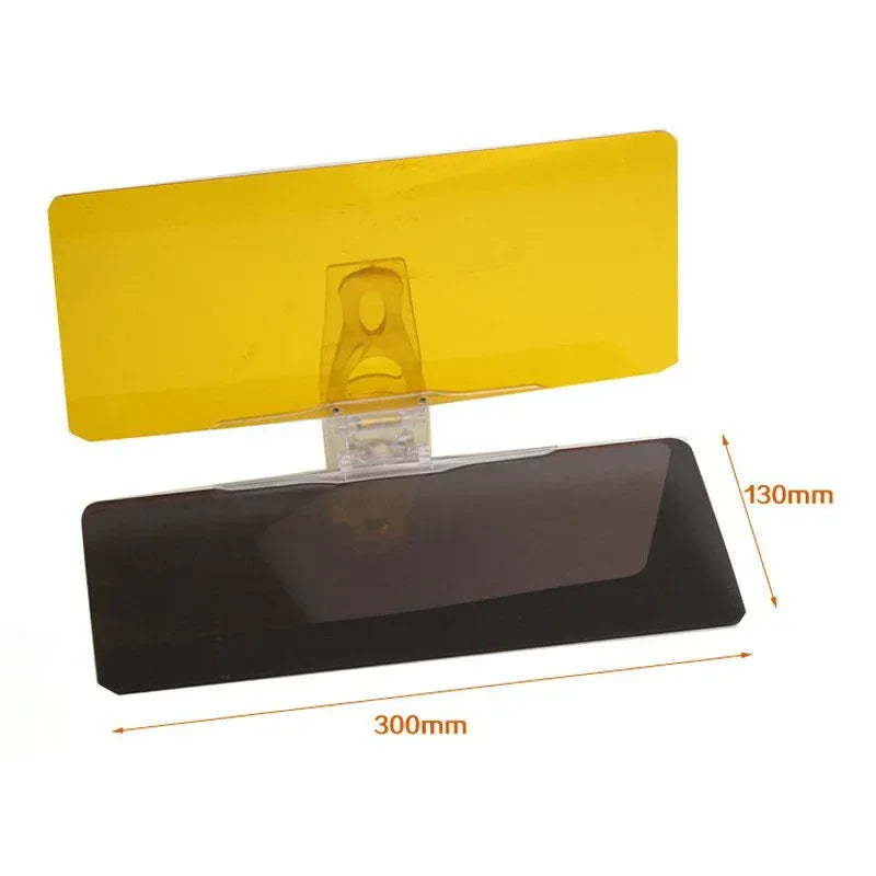Anti-dazzle car visor clipped onto a vehicle's sun visor, filtering bright sunlight through the windshield.