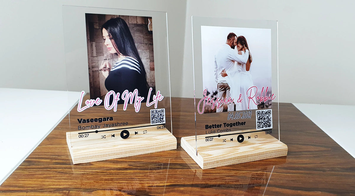 Close-up of personalized music plaque showing UV printed album cover and song information.