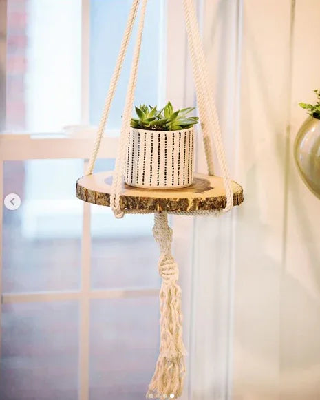 Diagram showing measurements of macrame plant hanger with 45 inch length and 12 inch diameter wooden tray