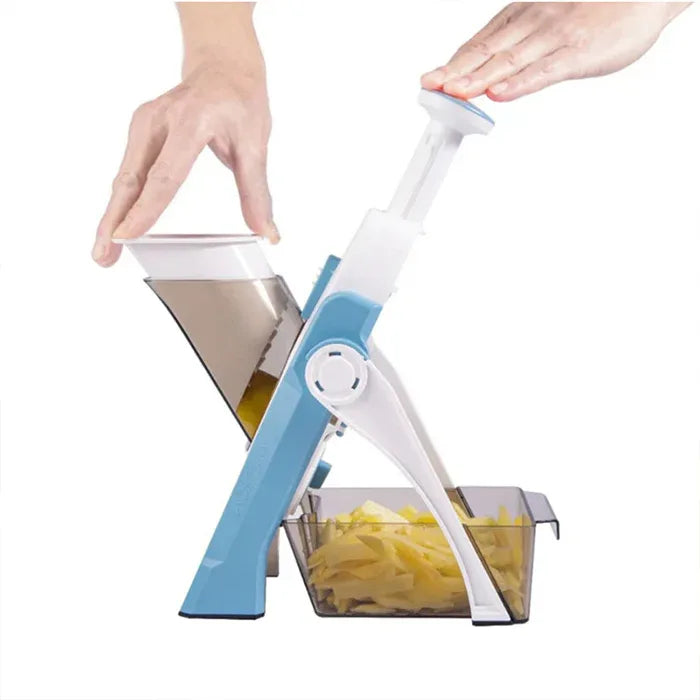 Hand pressing down on the vegetable chopper showing ease of use and ergonomic handle design.