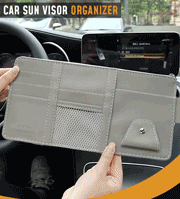 Animated gif demonstrating compact storage capacity of black car sun visor organizer in motion