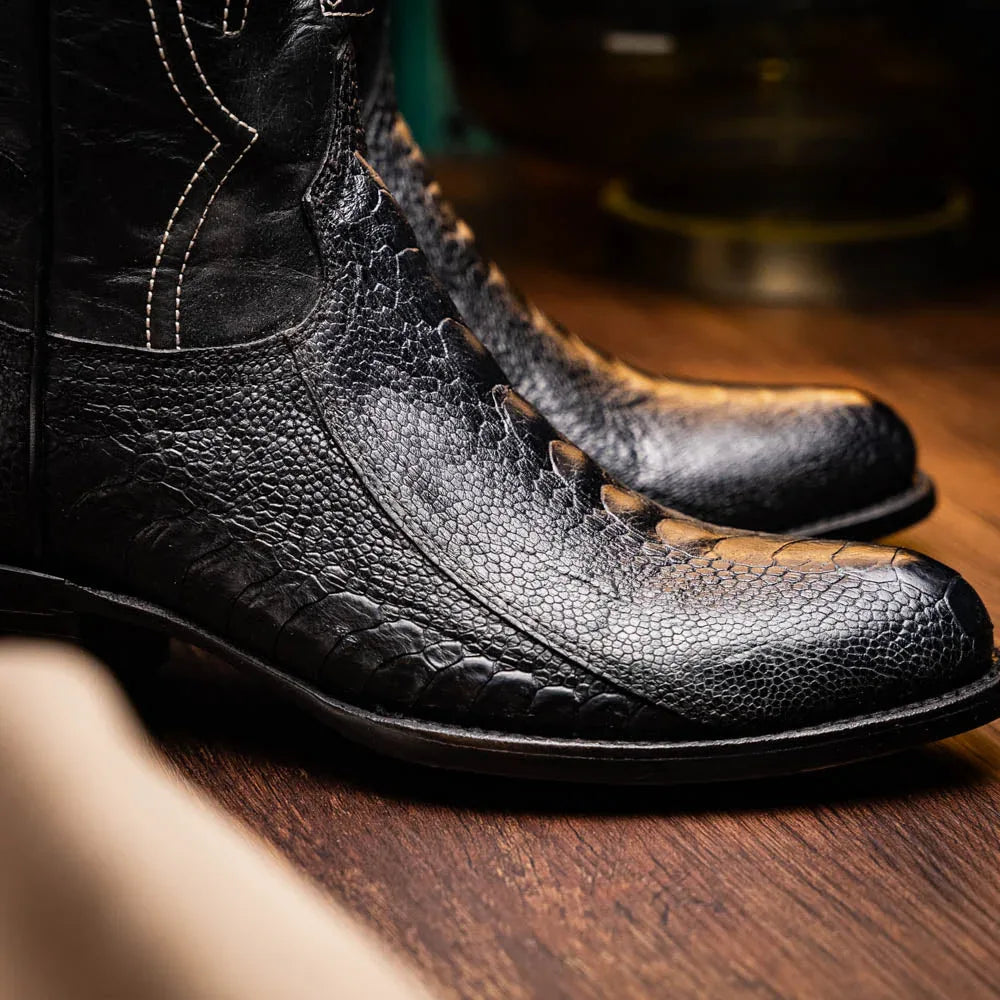 Denver Black boots worn with rolled jeans, showing side view and black leather shaft.