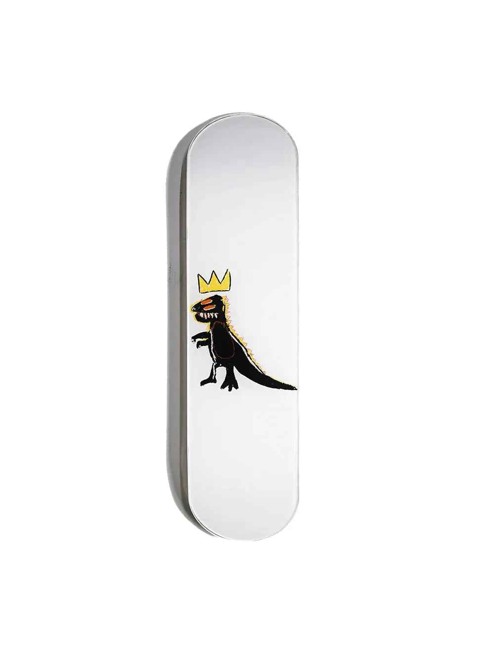 Skateboard with colorful dinosaur graphic laid on wooden floor