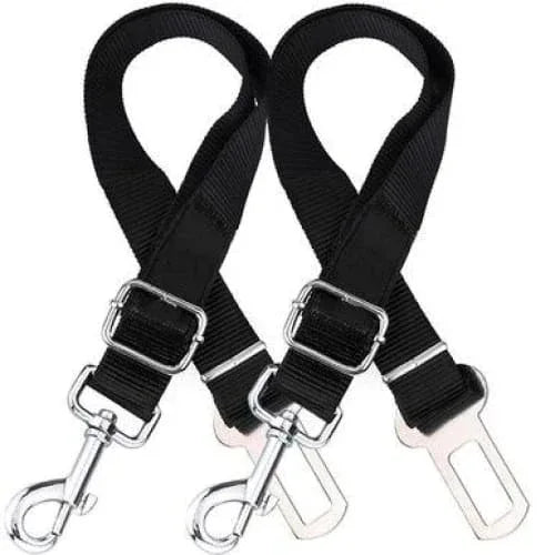 Two black adjustable dog seatbelt connectors with metal clips attached, designed for safe car travel with pets.