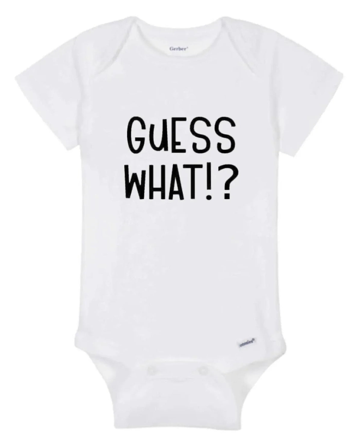 Close-up of white baby onesie fabric showing colorful 'Guess What!? Chicken Butt' print.