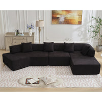 Modern minimalist 140-inch black L-shaped sectional couch shown without assembly.