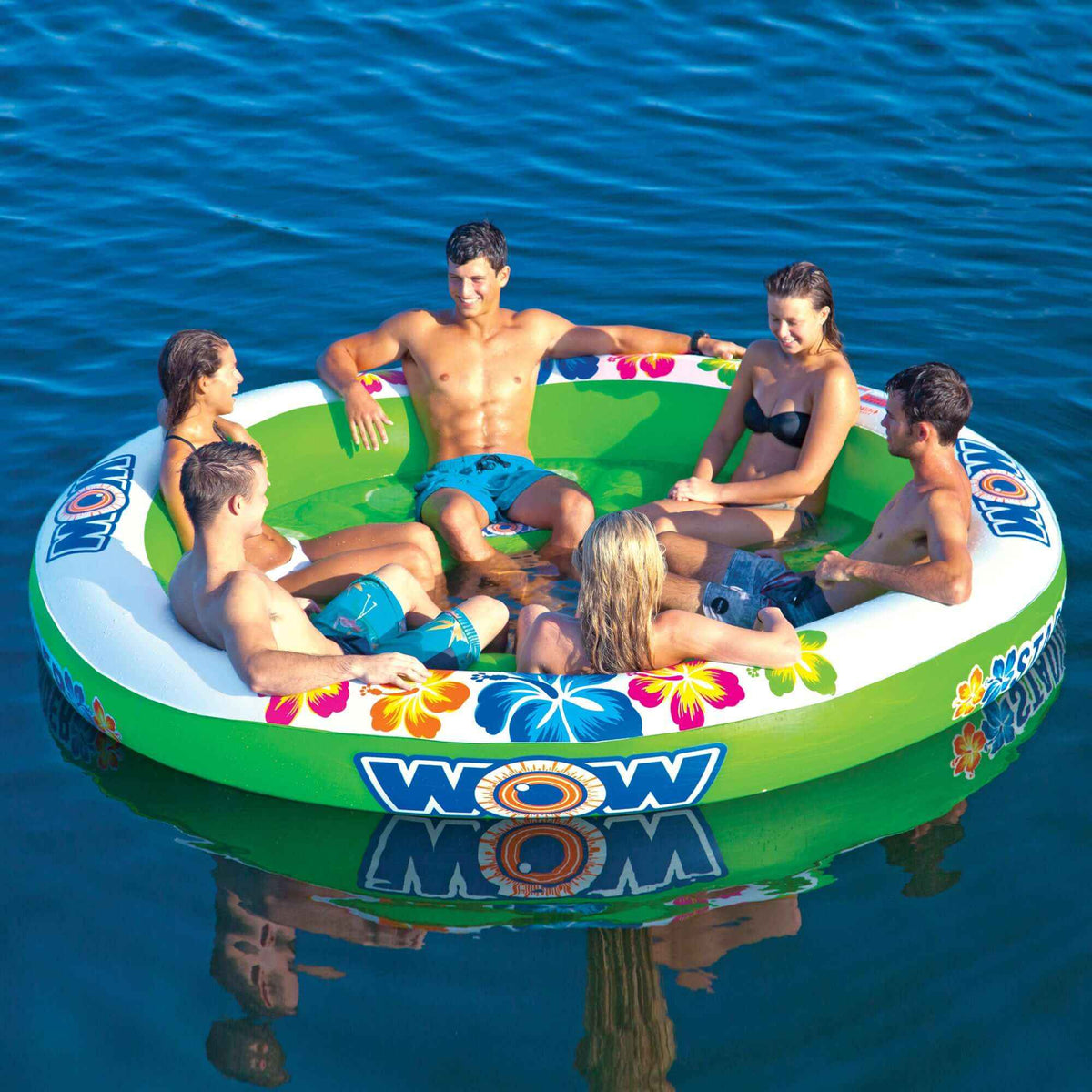 Top view of WOW Watersports Floating 6 Person Stadium Islander water lounge on clear blue water