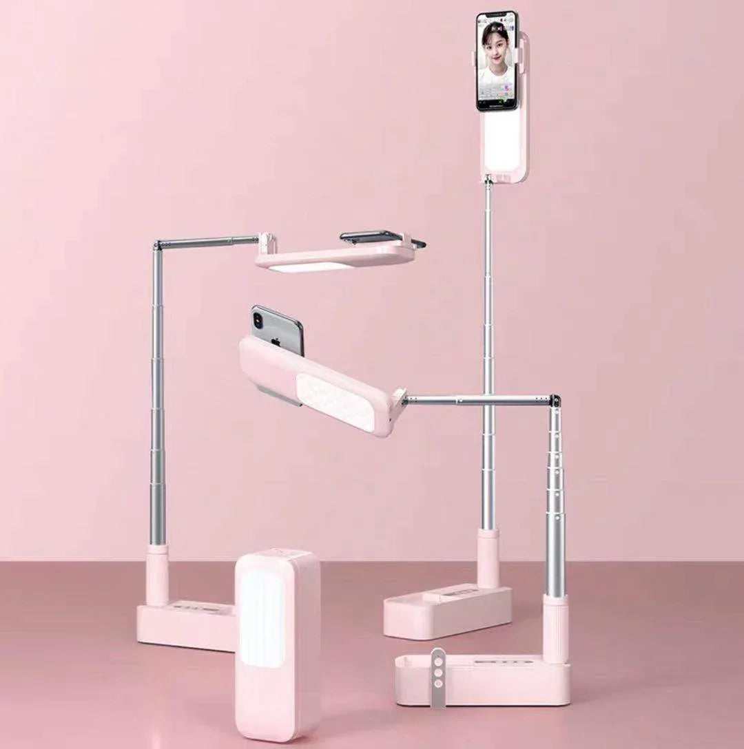 Selfie phone holder setup for live stream with smartphone and illuminated ring light.