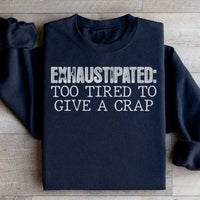 Black sweatshirt with peach-colored Exhaustipated To Tired To Give A Crap text displayed front and center.