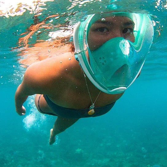 Side view of full-face snorkel mask highlighting the curved breathing tube and visor.