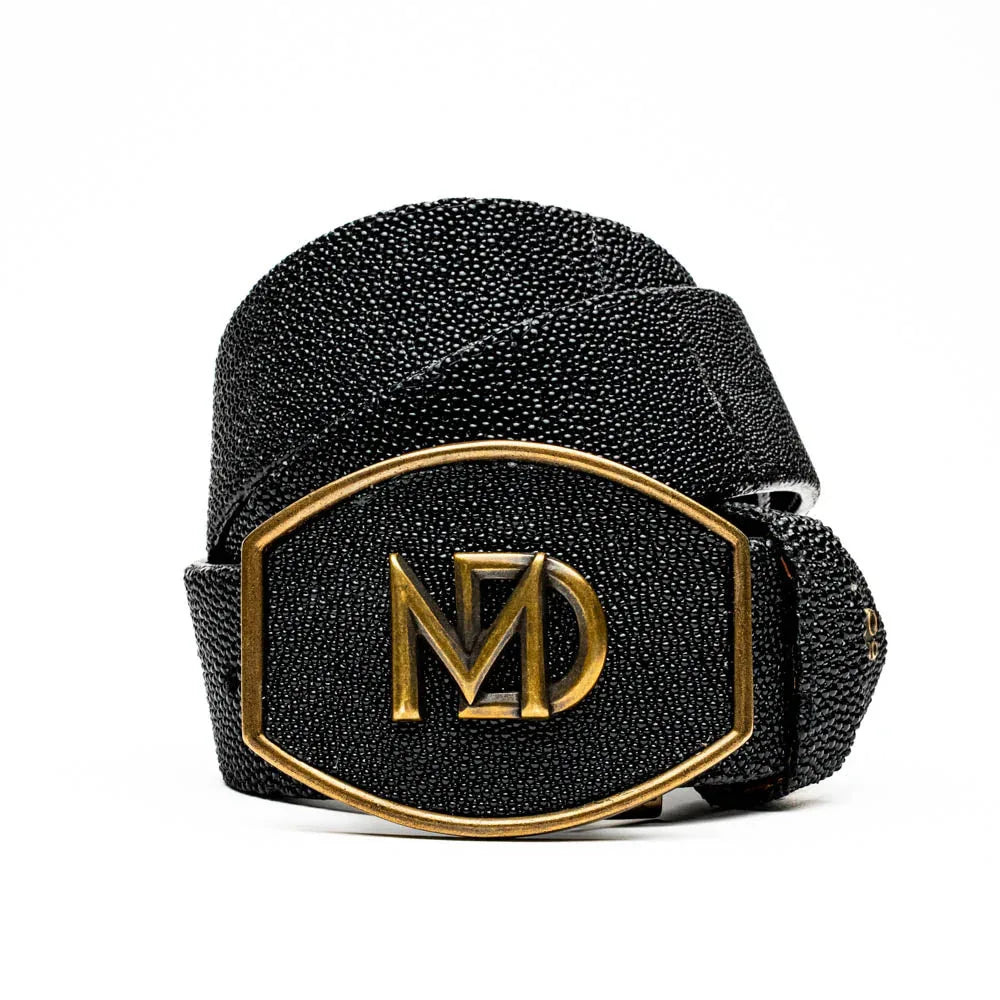 Close-up of black stingray skin belt showing textured surface and polished finish