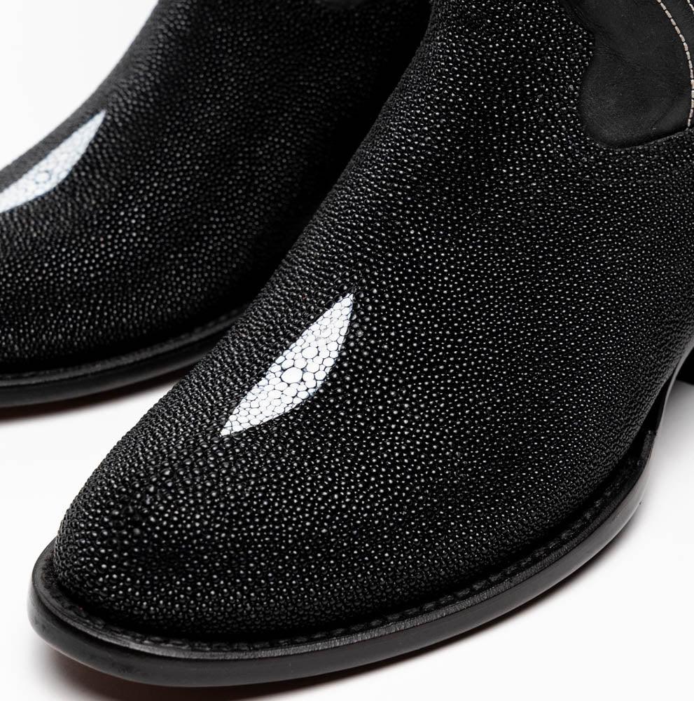 Detail of the full-grain leather shaft with subtle texture and red lining peeking from Georgia boot.