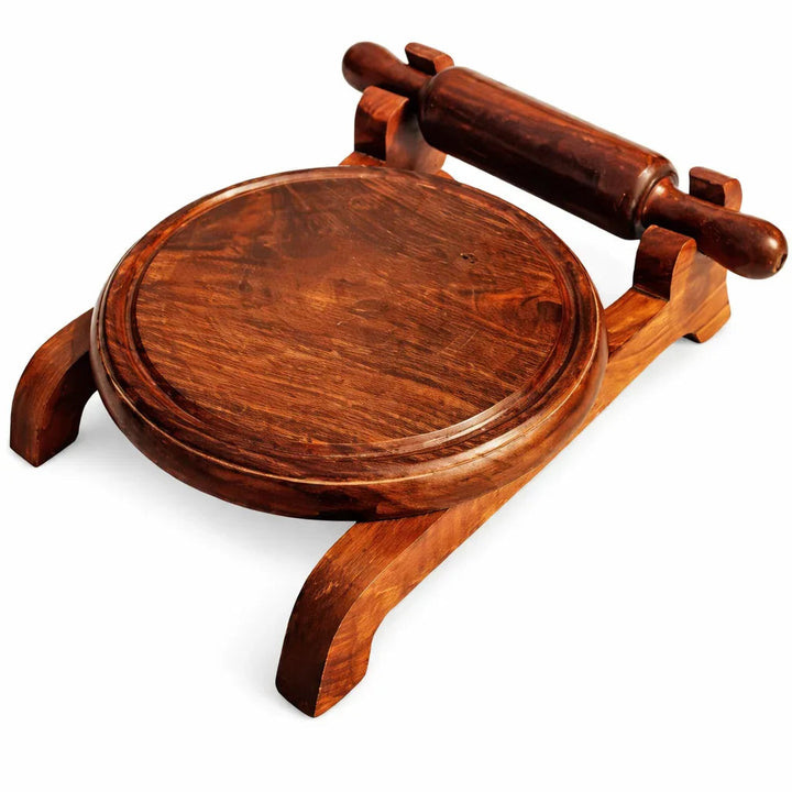 Handcrafted wooden chakla belan set showing rolling board and pin on white background.