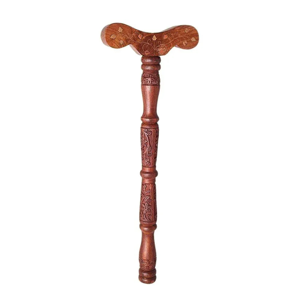 Wooden Yoga Danda Stick for breathing practice lying on a wooden surface with natural light