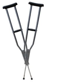 Pair of adjustable under arm auxiliary crutches with ergonomic handles and rubber tips on white background.