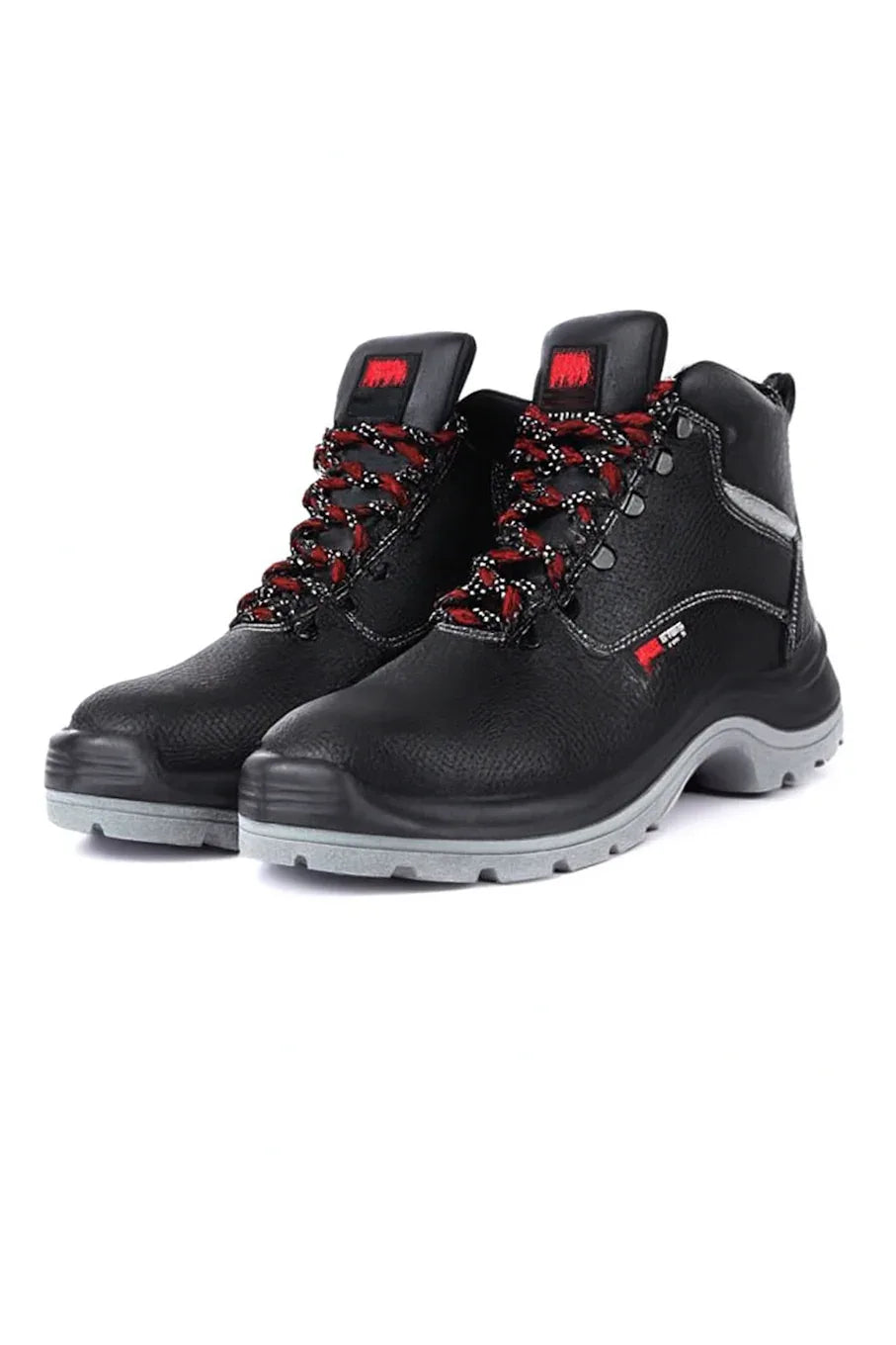 Black safety boots with thick red rubber soles designed for fire protection and industrial use.