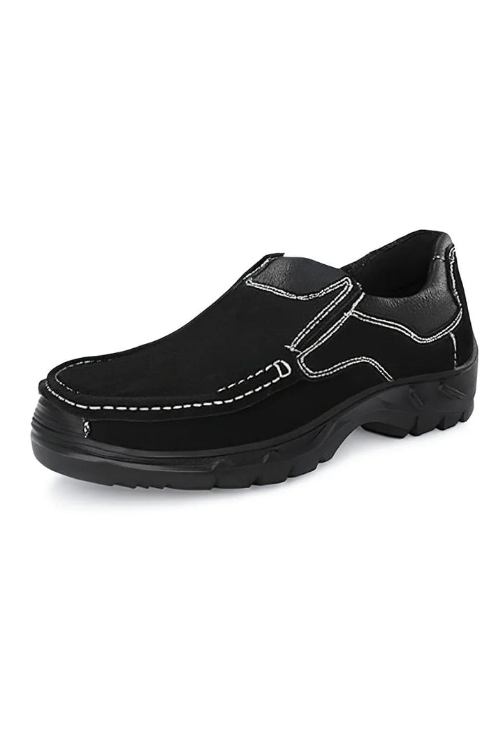Black slip-on safety boots with white stitching, designed for fire protection and industrial use.