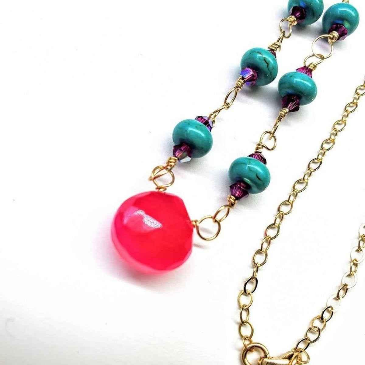 Handcrafted gold-filled necklace showcasing vibrant pink and turquoise gemstones in drop design.