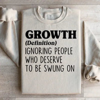 Sand colored fleece sweatshirt with soft fleece interior and 'growth' graphic.