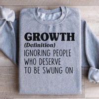 Sport grey fleece sweatshirt featuring 'growth' artwork and cozy fleece lining.