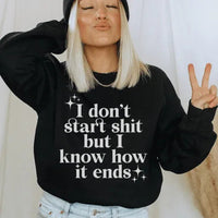 Black fleece sweatshirt with white I Know How It Ends text, small size, front view.