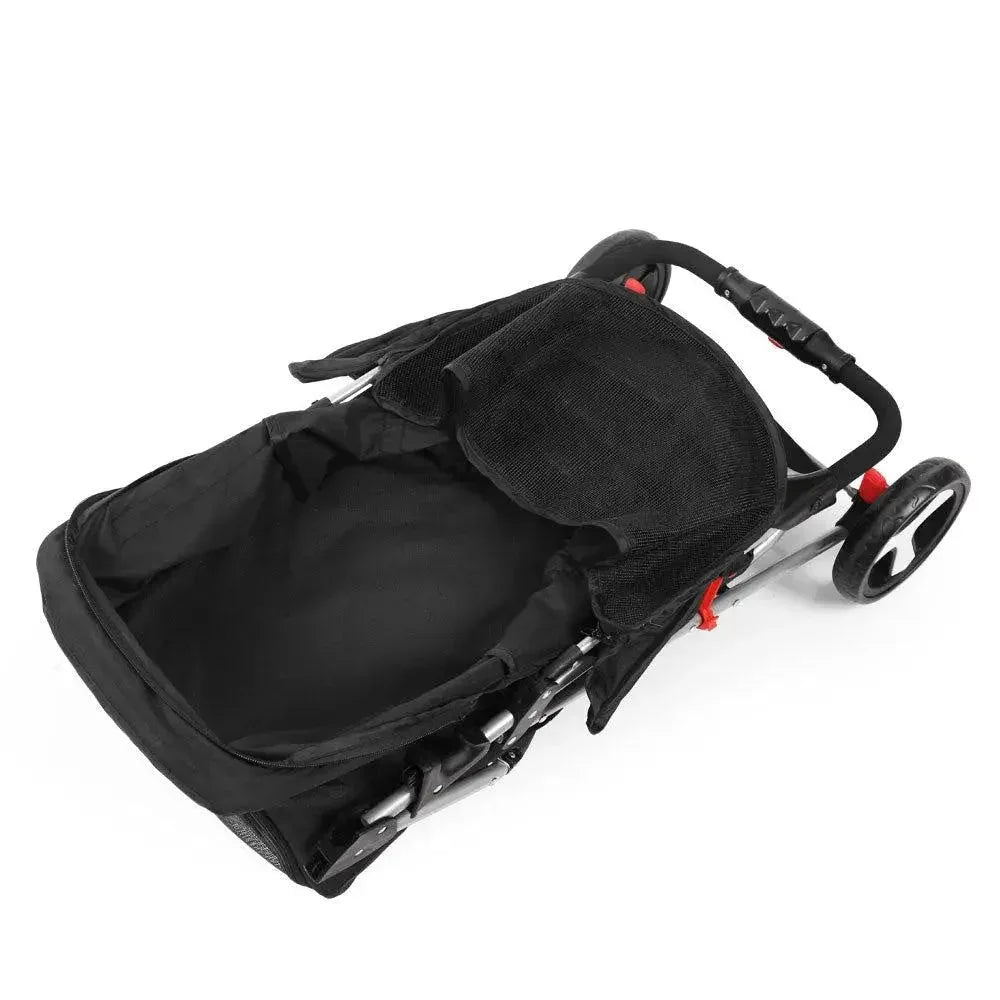 Close-up of i.Pet pet stroller front wheels and brake mechanism in black.