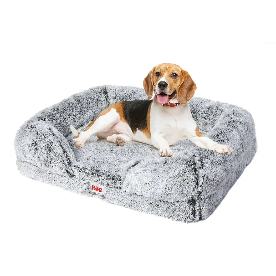 Top-down view of soft orthopedic pet bed with raised edges in cream color