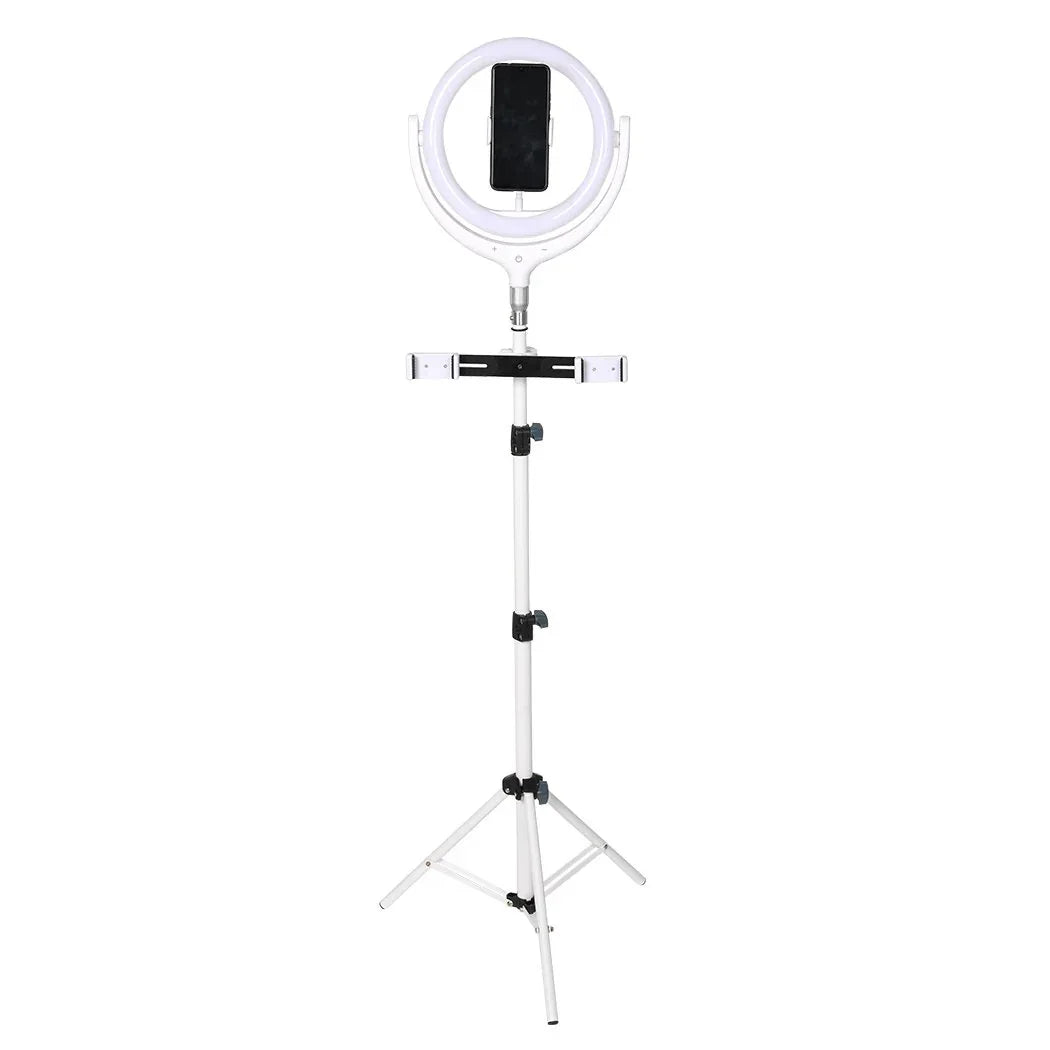 12-inch LED ring light mounted on a tripod with phone holder, showing the ring light illuminated.