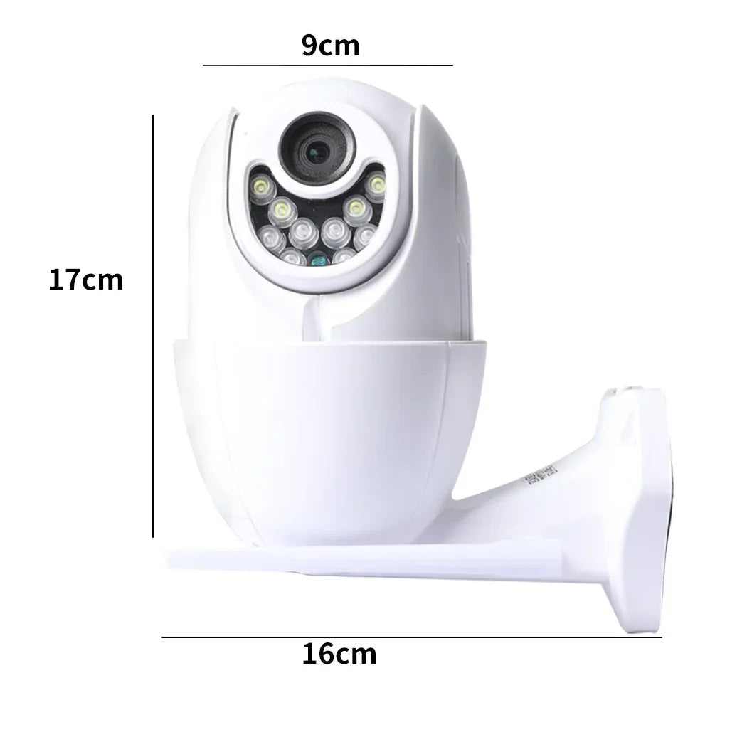 Security camera attached to outdoor wall near house entrance for home surveillance.