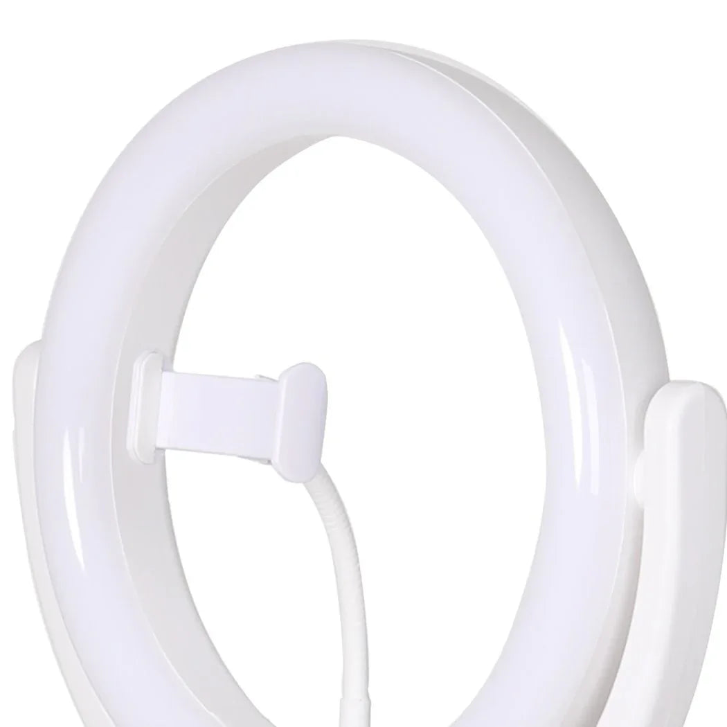 LED ring light with tripod stand folded down for easy travel and storage.