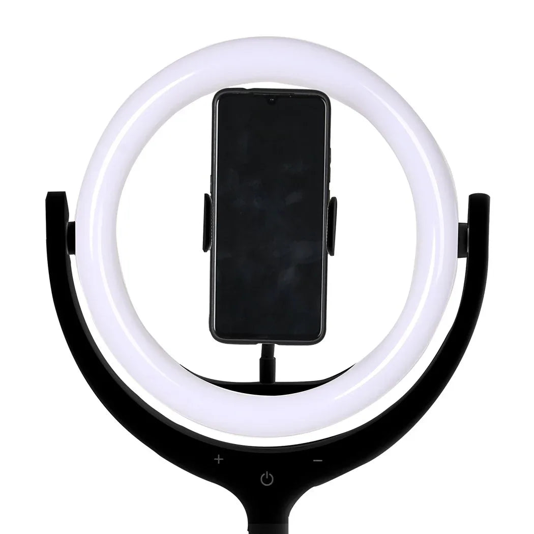LED ring light mounted on tripod with smartphone holder rotated 360 degrees for perfect shot.