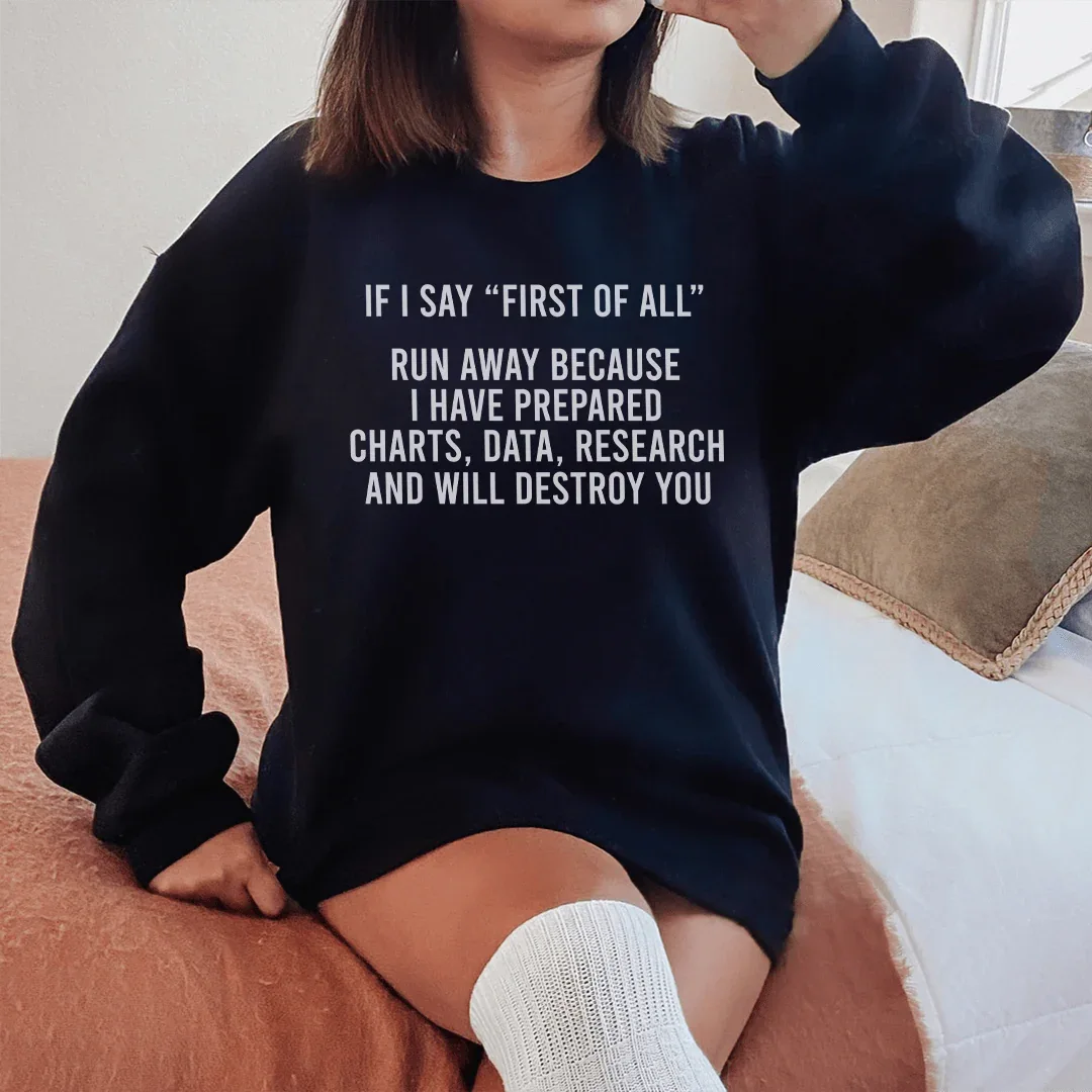Black fleece sweatshirt with text 'If I Say First Of All Run Away' on front, displayed on white background.