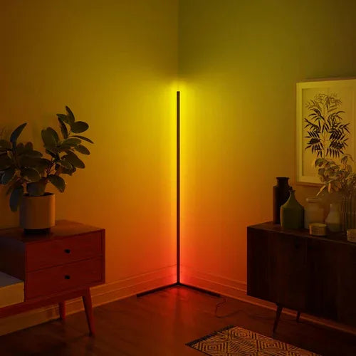 RGB LED corner floor lamp displaying bright vibrant colors, perfect for home ambiance.