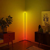 RGB LED corner floor lamp displaying bright vibrant colors, perfect for home ambiance.