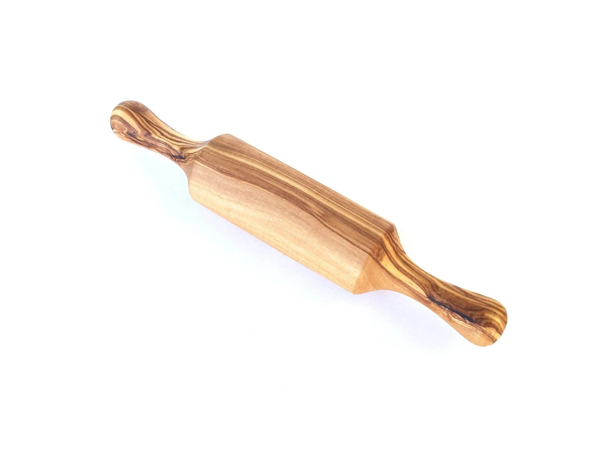 Close-up of the smooth wooden surface and ergonomic dual handles of the mini rolling pin.