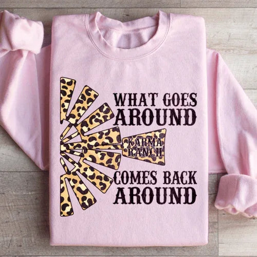 Close-up of Karma Ranch sweatshirt sleeve with adjustable banded cuff detail