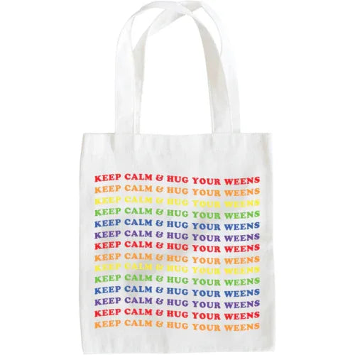 Detailed view of cream tote bag with colorful wiener dog graphic and inspirational Keep Calm message.