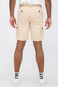 Close-up of back view of khaki cargo shorts highlighting two back pockets.