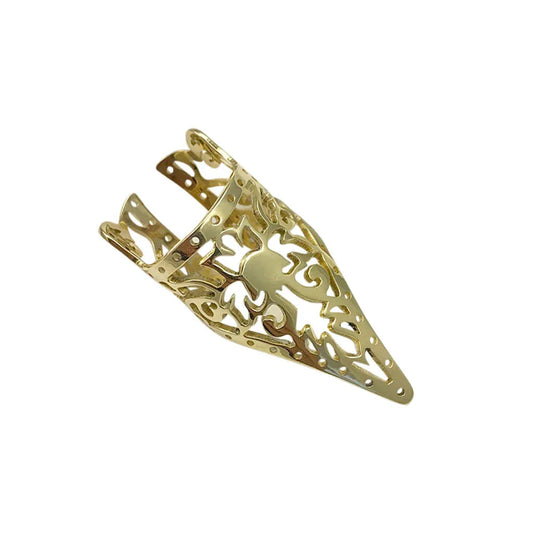 Close-up of a polished gold Khmer Temple ring with traditional pattern on white background