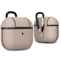 Green leather AirPods 3 case angled to show overall slim profile and button access.