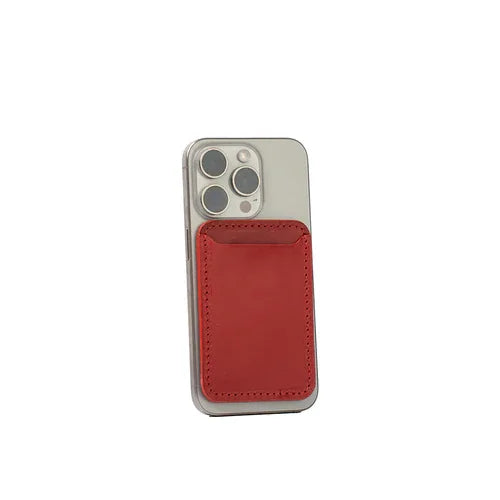 Classic red leather MagSafe wallet for iPhone, showing fine craftsmanship details.
