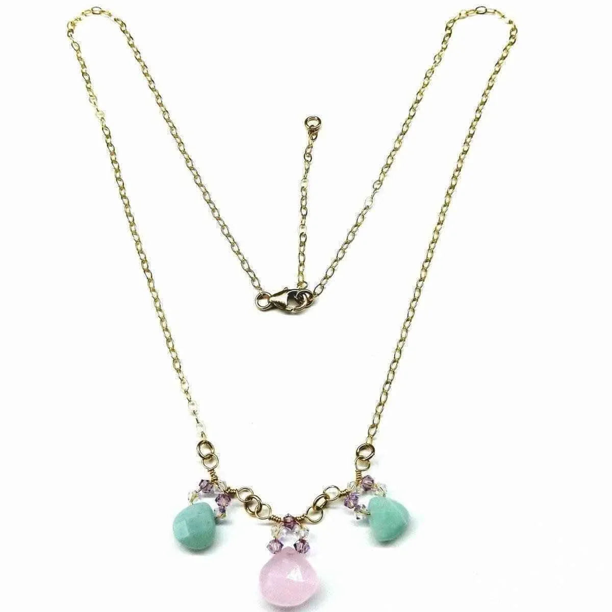 Handcrafted 14 K gold filled necklace displayed on white background highlighting pink and mint green gems