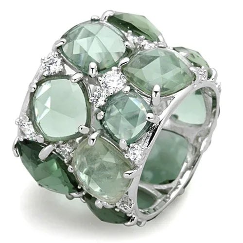 Side view of sterling silver ring with synthetic emerald glass stone, polished rhodium finish.